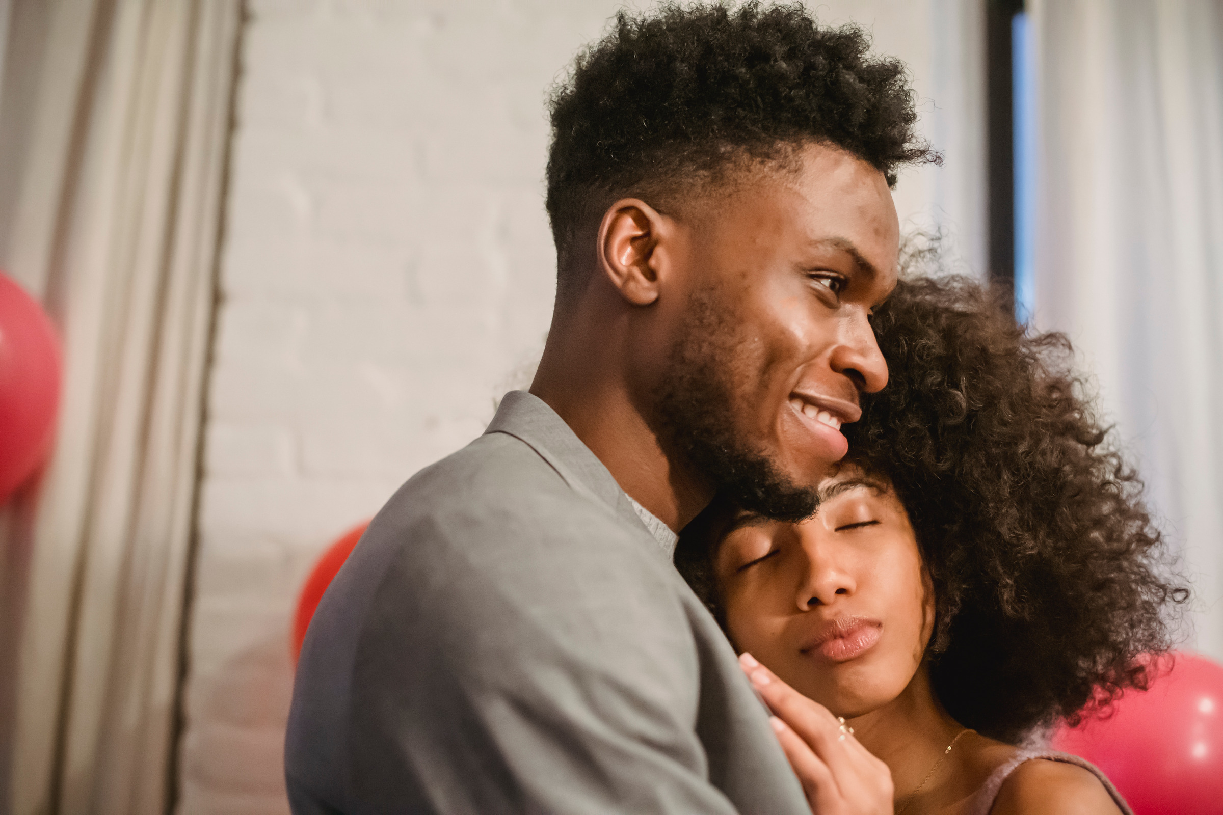 Couple sharing a warm, connected moment together.